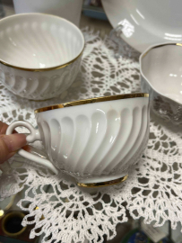 Чашка от кофейного сервиза ЛФЗ. Рельефный фарфор с позолотой. Винтаж. Цена за 1шт. Картинка 2